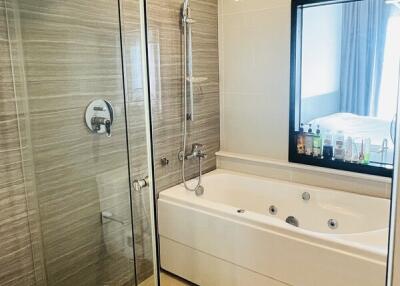 Modern bathroom with bathtub and shower