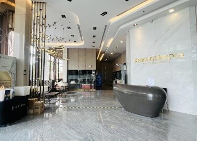 Elegant lobby area of a modern building with stylish furniture and decor