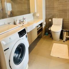 Modern Bathroom with Washer and Dryer