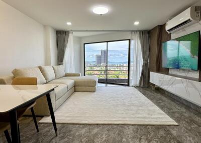 Modern living room with large windows and a view