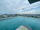 Rooftop infinity pool with city skyline view