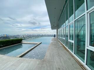 Rooftop pool area with city view