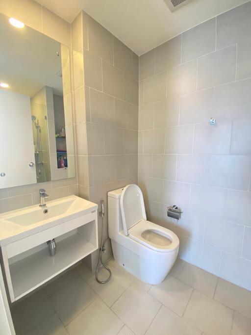 Modern bathroom with sink and toilet