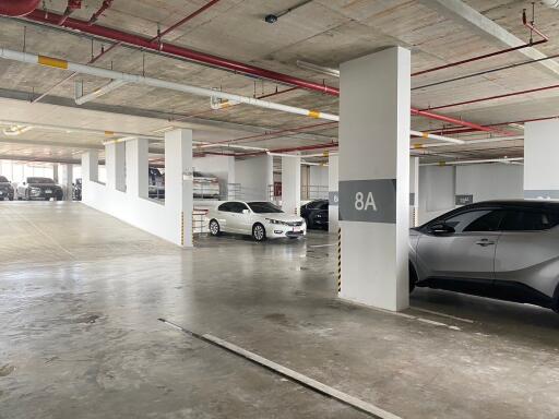 Indoor parking garage with designated parking spots