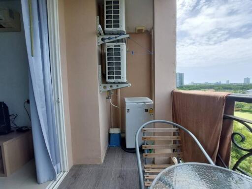 Balcony with air conditioning units and outdoor furniture