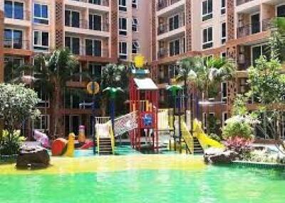 Residential building with playground and pool