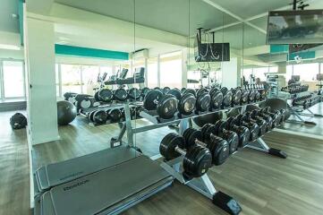 Well-equipped gym with weights and exercise machines