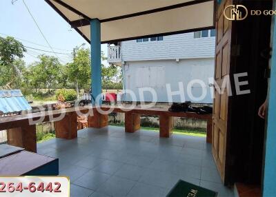 Covered patio area with outdoor seating