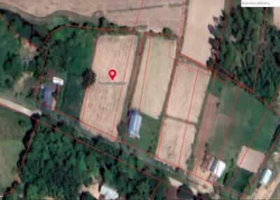 Satellite view of a property with outlined plots