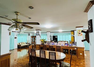 Spacious living room with dining area and seating space