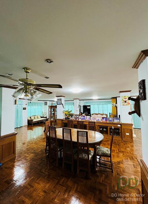 Spacious living room with dining area and seating space