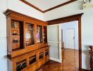 Living room with wooden cabinet and wooden flooring