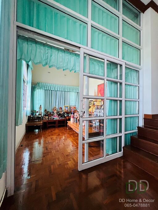 Spacious Living Room With Wooden Flooring