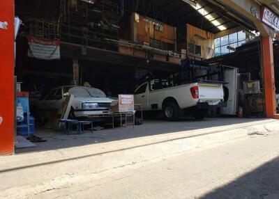 Garage with multiple vehicles and storage