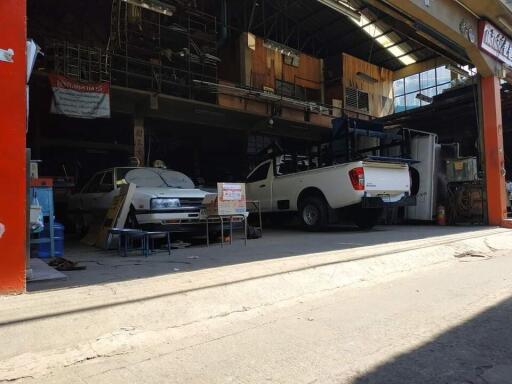 Garage with multiple vehicles and storage