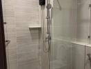 Modern bathroom with glass shower partition and water heater