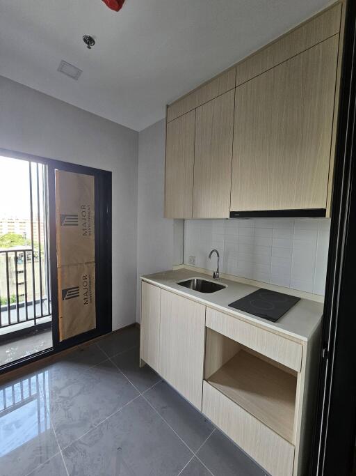 Modern kitchen with balcony view