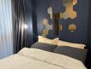 Cozy bedroom with modern decor and geometric wall art