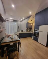 Modern kitchen with dining area