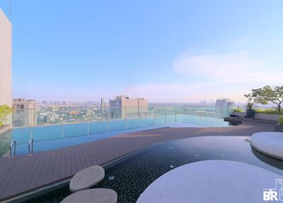 Modern outdoor pool with city view