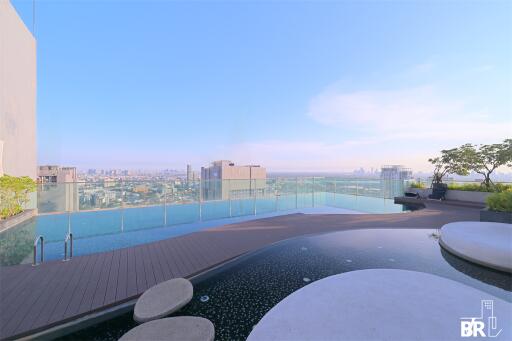 Modern outdoor pool with city view