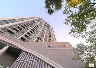 Exterior view of a tall residential building named Rhythm