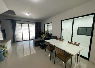 Spacious living room with dining area