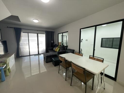 Spacious living room with dining area