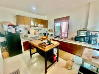 Modern kitchen with a central island and appliances