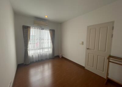 Bright room with window and wooden floor