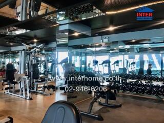 Modern gym with equipment and mirrors