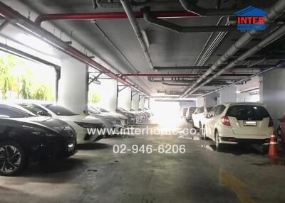 Indoor parking garage with multiple parked cars