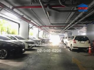 Indoor parking garage with multiple parked cars