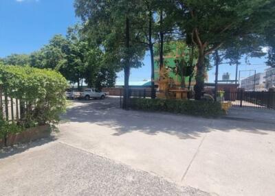 Driveway with trees and gate