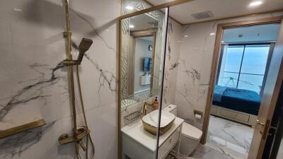 Modern bathroom with marble wall tiles