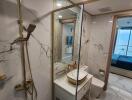 Modern bathroom with marble wall tiles