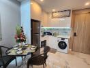 Modern kitchen with dining area and appliances