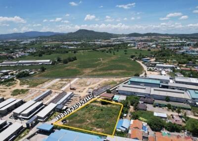 Aerial view of a property area with surrounding buildings