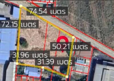 Aerial view of a land plot with dimensions labeled