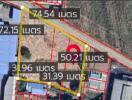 Aerial view of a land plot with dimensions labeled