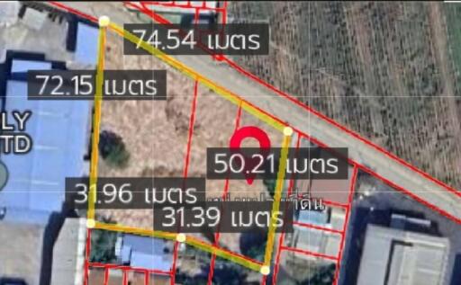 Aerial view of a land plot with dimensions labeled