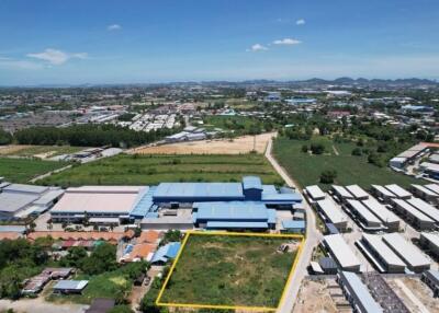 Aerial view of a property lot within an industrial or commercial area.