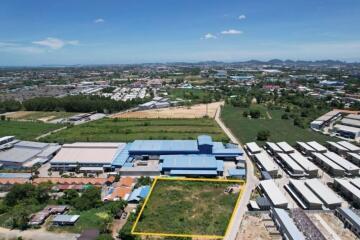 Aerial view of a property lot within an industrial or commercial area.
