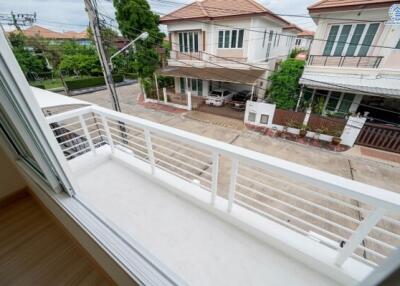 View from balcony overlooking residential street