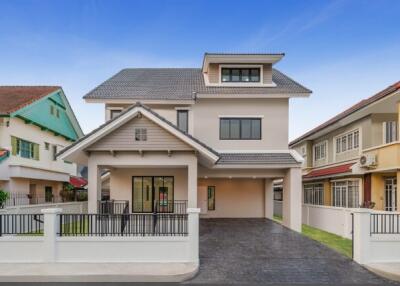 Front view of a modern house with driveway