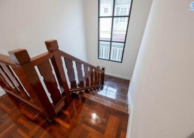 Wooden staircase with window