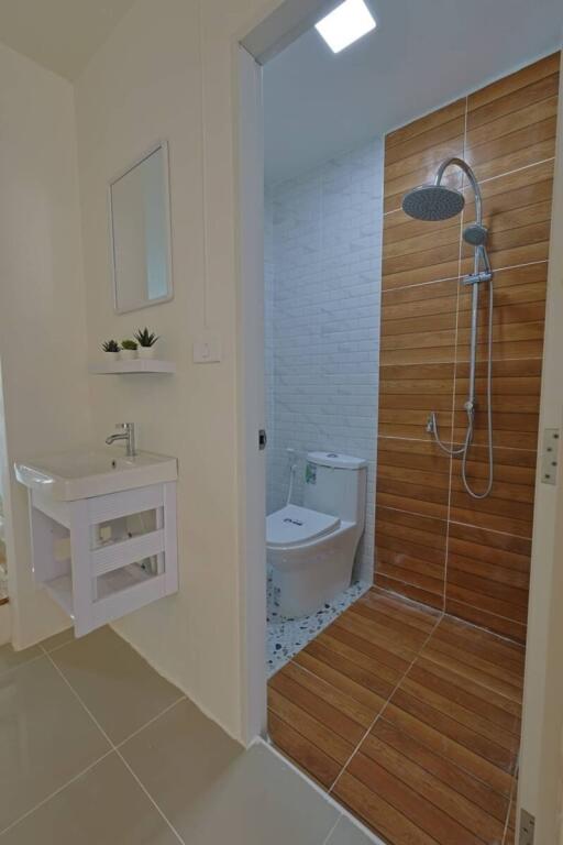 Modern bathroom with shower and toilet