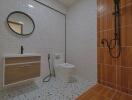 Modern bathroom with tiled walls and shower area