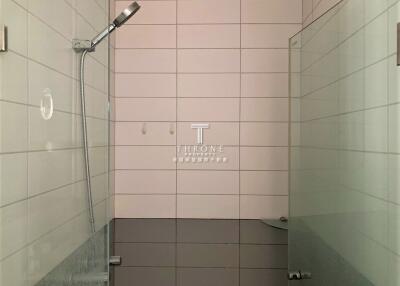 modern bathroom shower with glass panel