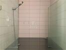 modern bathroom shower with glass panel